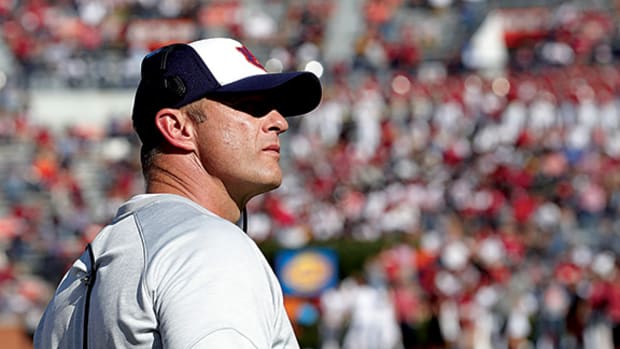 Auburn coach Bryan Harsin coaches his final game against Arkansas.